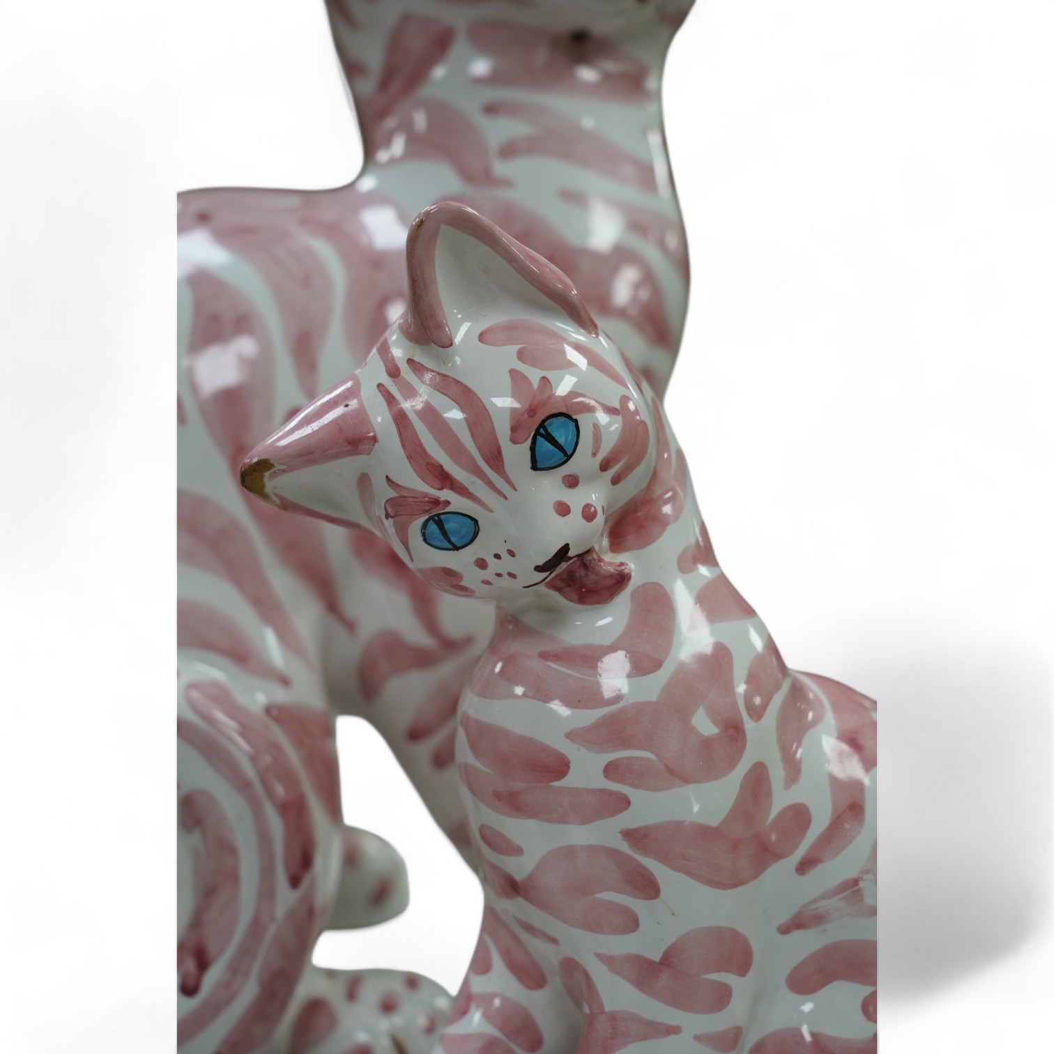 A large 1950's Italian pink maiolica seated cat and two smaller, largest 45cm. Condition - poor